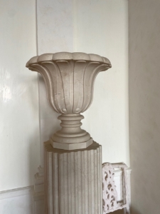 Classical Carved Planter and Fluted Pedestal in Crema Marfil Marble